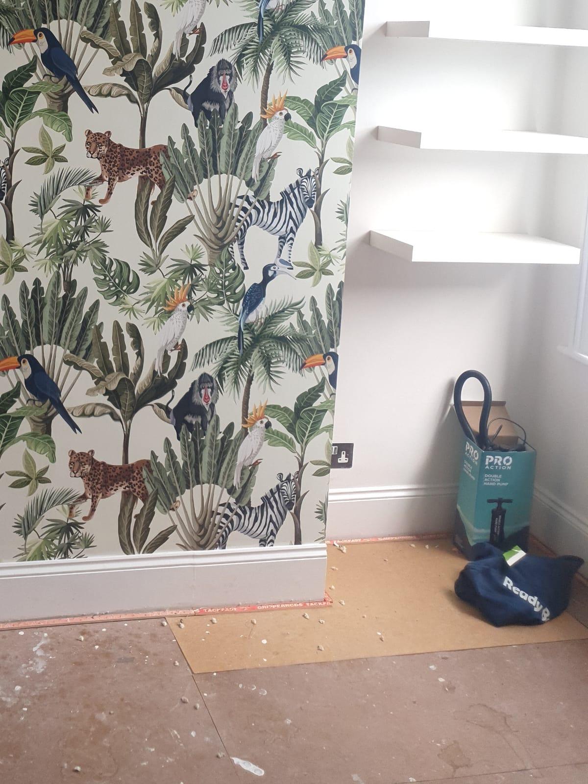 Jungle animal wallpaper in children's room, Essex